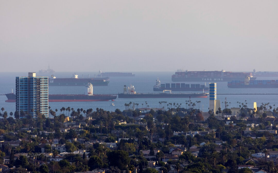 FILE PHOTO: Container ships wait off the coast of the congested ports of Los Angeles and Long Beach, in Long Beach