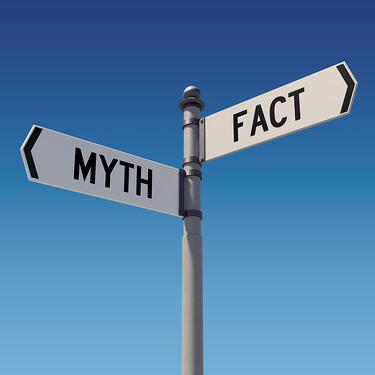 street-signs-pointing-opposite-directions-myth-or-fact-picture-id842293398